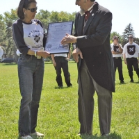 Gary "Pops" O'Maxfield presents Marjorie Adams a symbolic "Nestor of Ball Players" document at The Hartford Base Ball Grounds at Colt Meadows on Doc Adams Day, September 10, 2011.